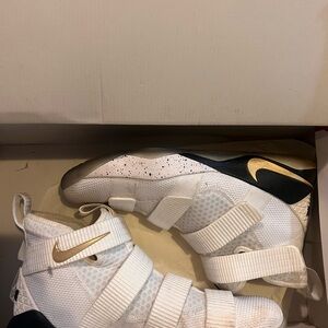 Nike Lebron SoilderXI White Sneakers with Gold Accents